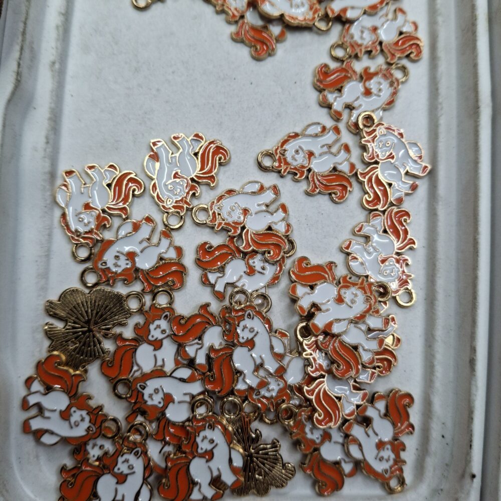 unicorn orange charm